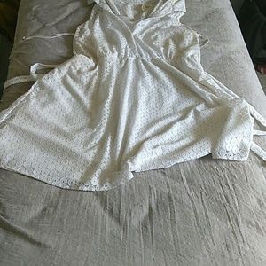 I'm selling a white beautiful summer time dress.